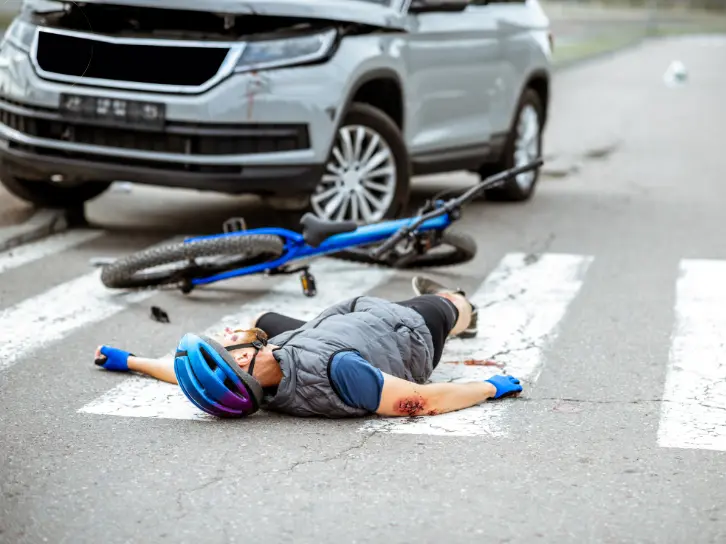 Cyclist injured in traffic accident scene