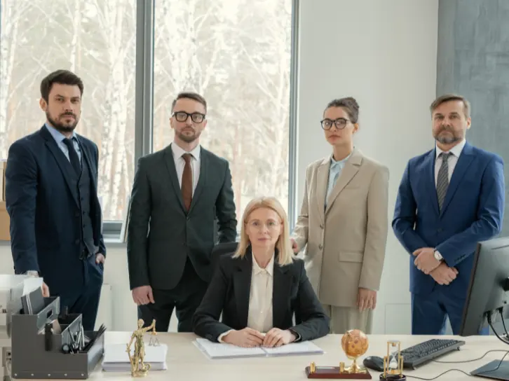 Legal professionals reviewing medical chronology case documents